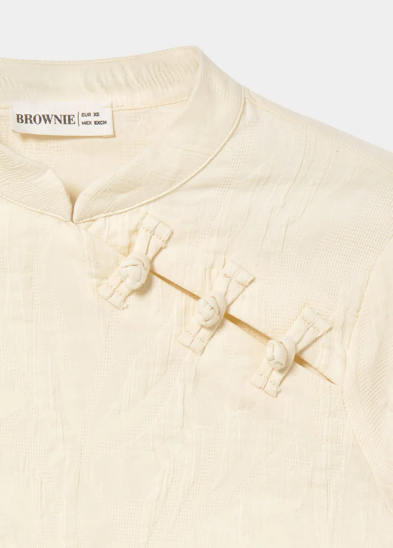 Jacquard blouse with button detail