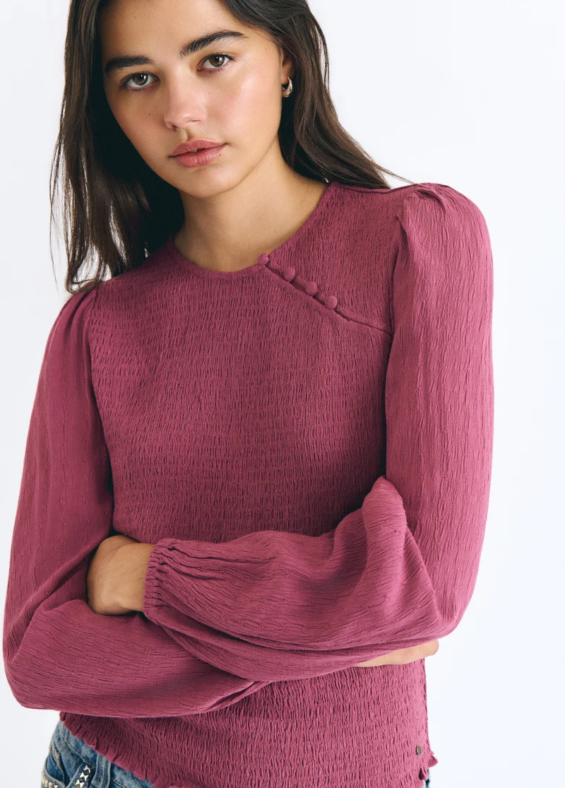 Smocked blouse with buttons