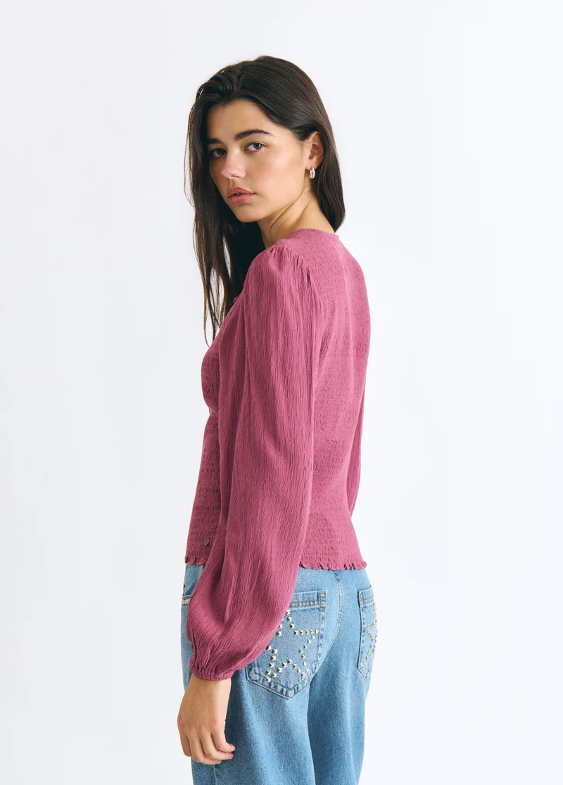 Smocked blouse with buttons