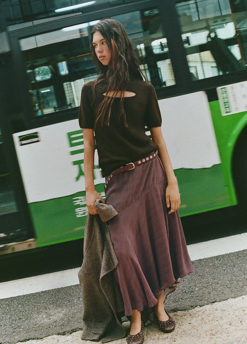 Long plaid skirt with an asymmetric hem
