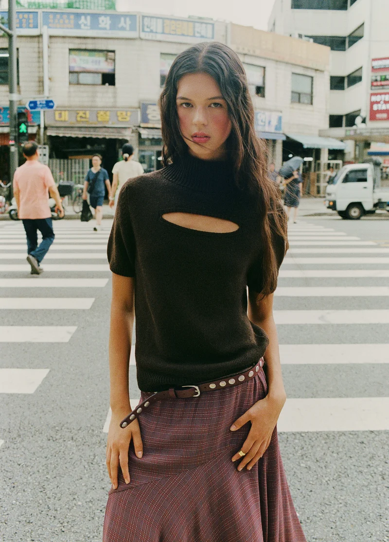 Long plaid skirt with an asymmetric hem