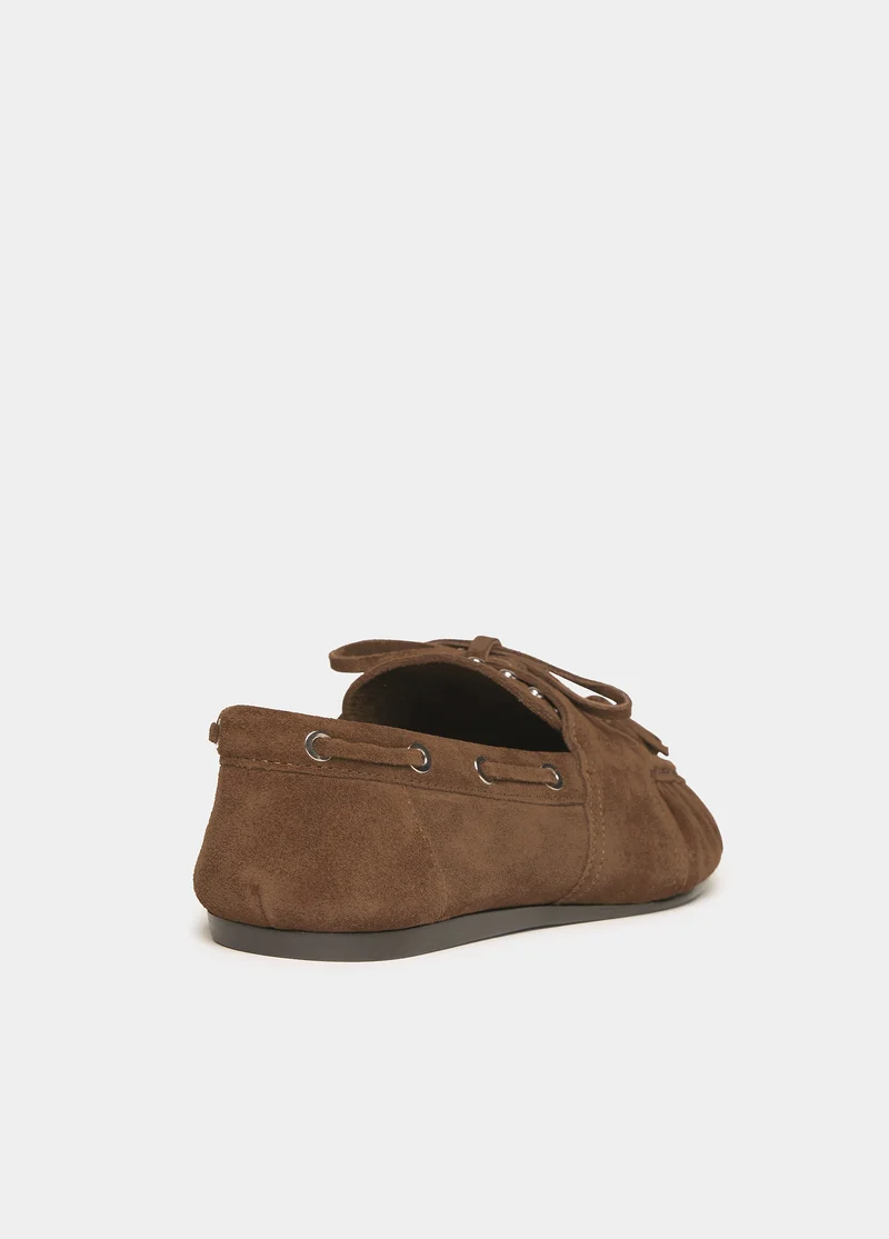 Suede boat shoe with studs