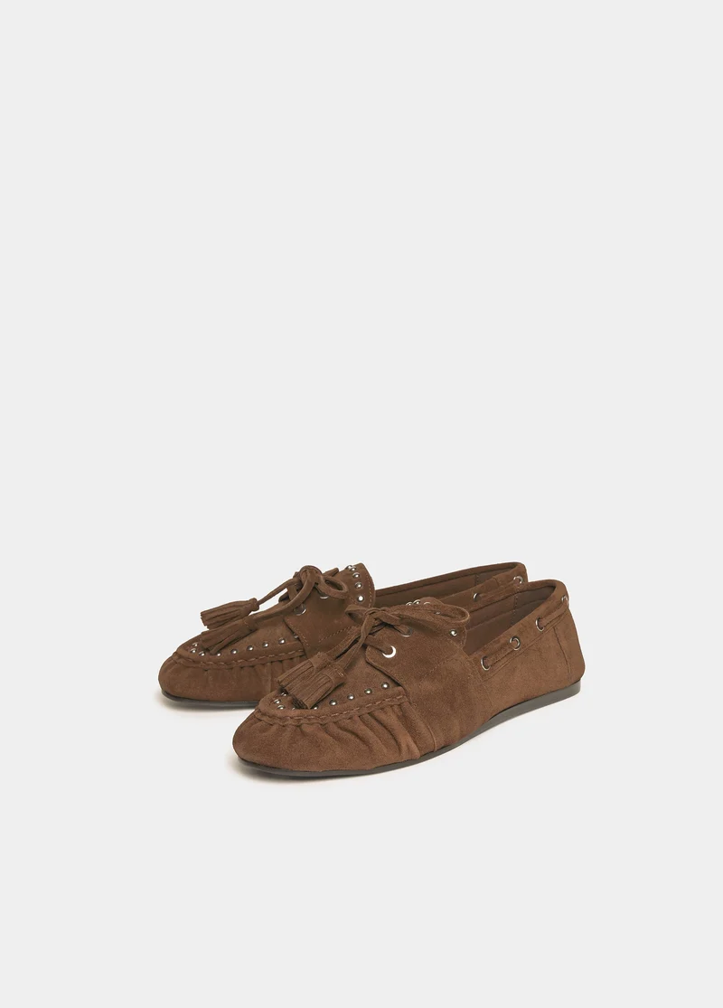 Suede boat shoe with studs