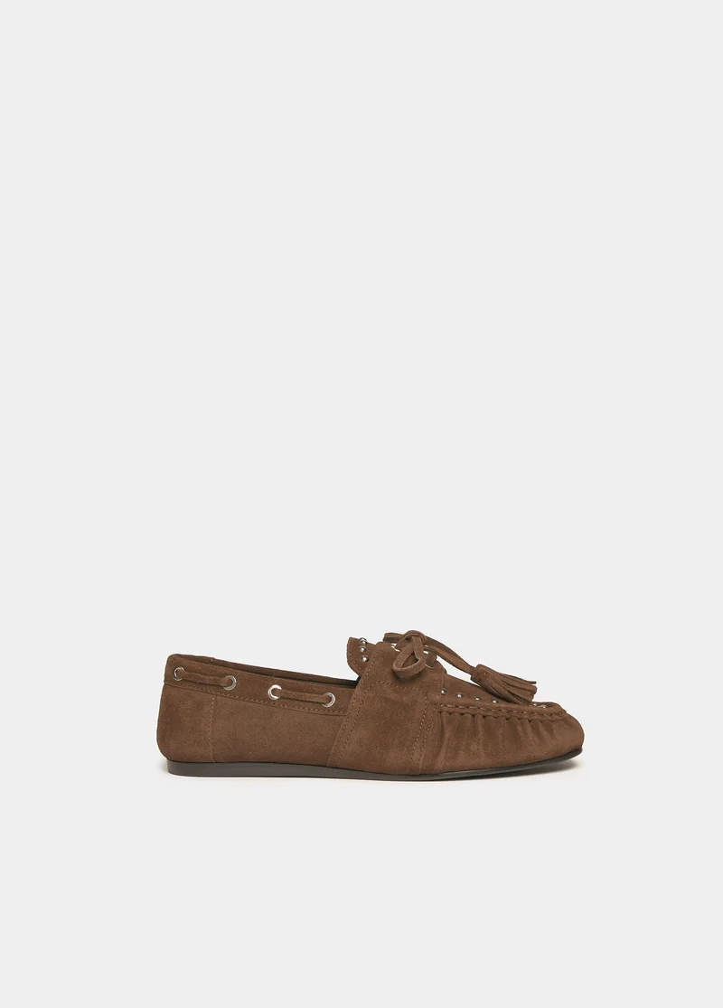 Suede boat shoe with studs