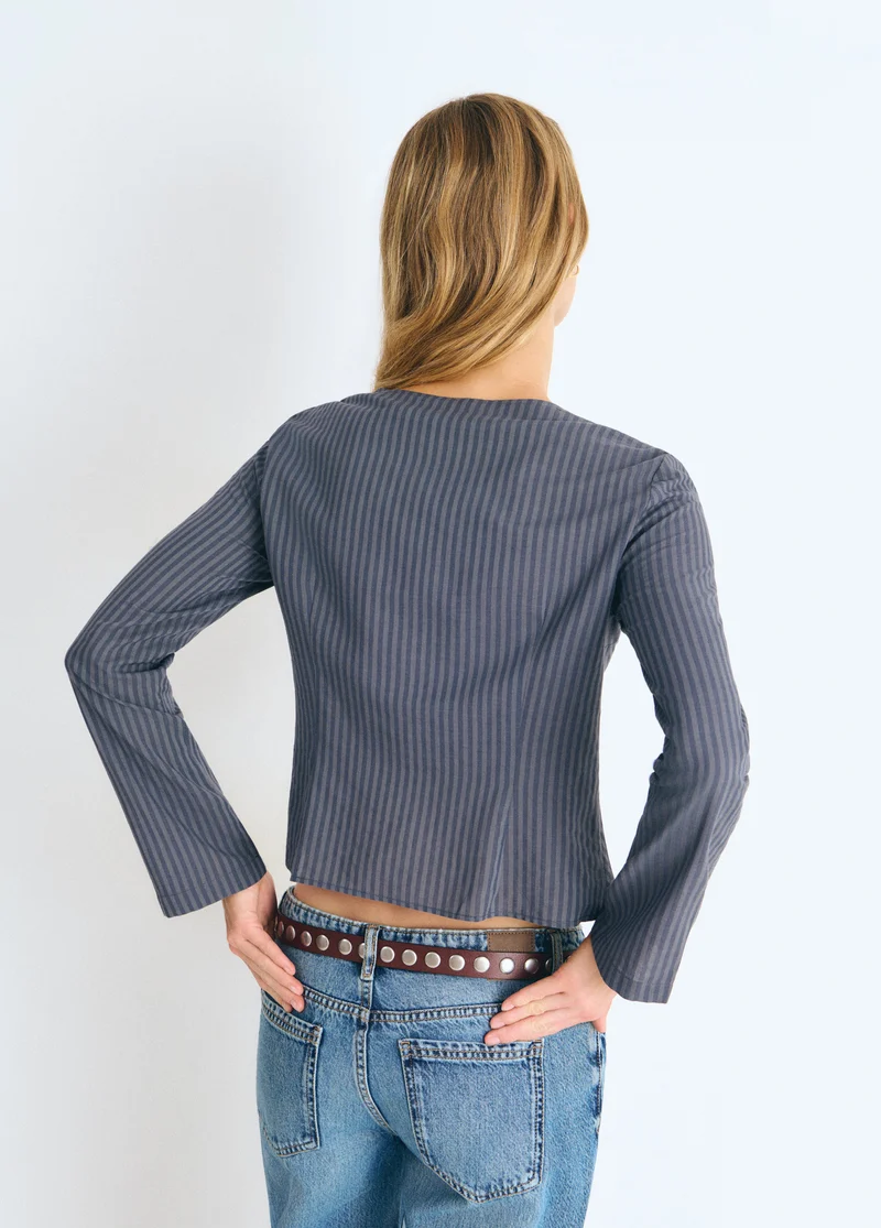 Striped blouse with crossover buttons