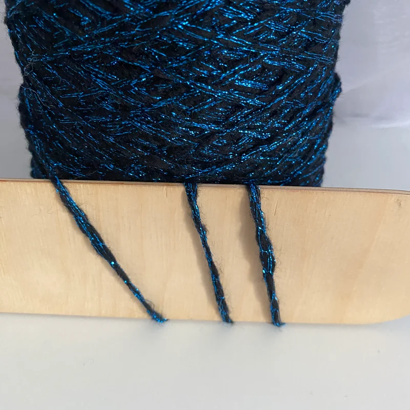 Konenwolle Alpaka mit Lurex 300 g.