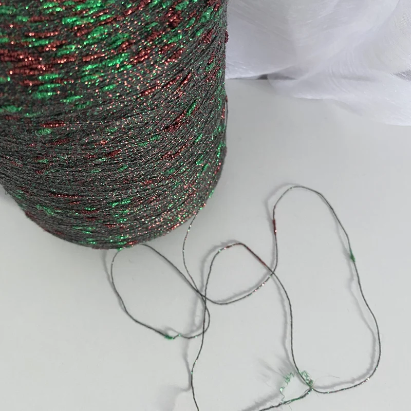 Konenwolle Merinowolle mit Lurex.