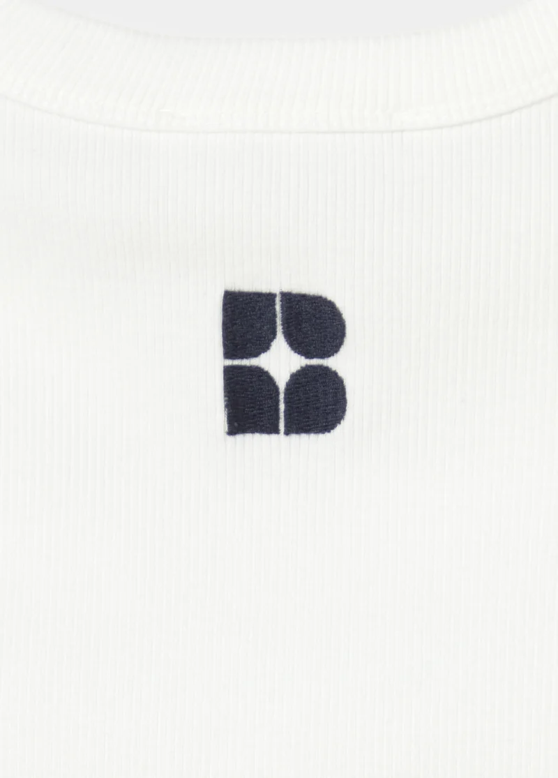 Embroidered logo top