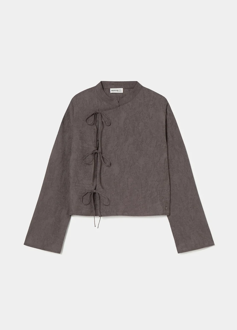 Jacquard blouse with bow details