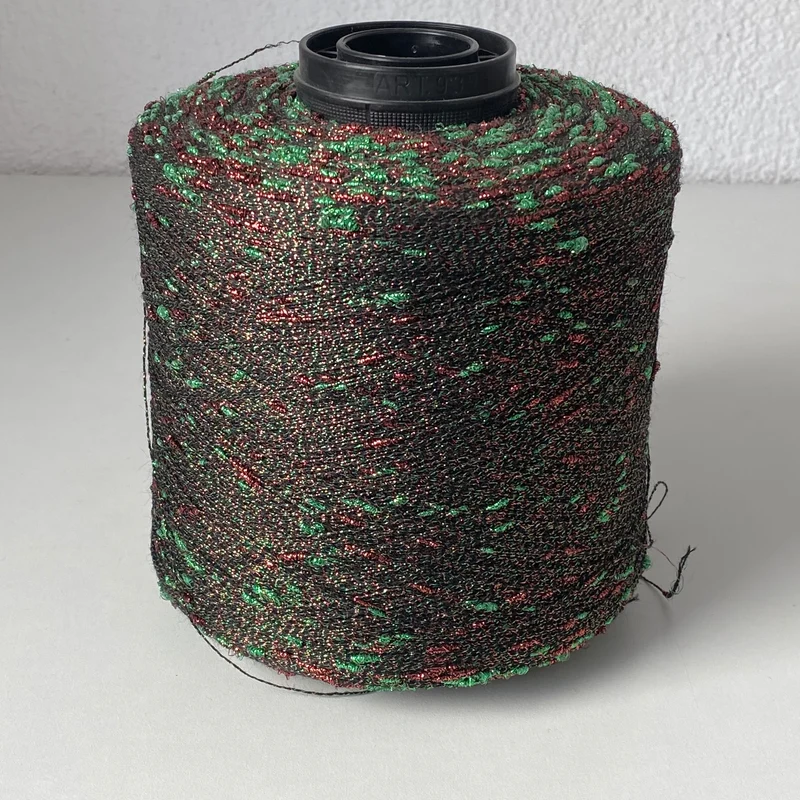 Konenwolle Merinowolle mit Lurex.