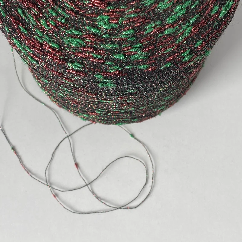 Konenwolle Merinowolle mit Lurex.