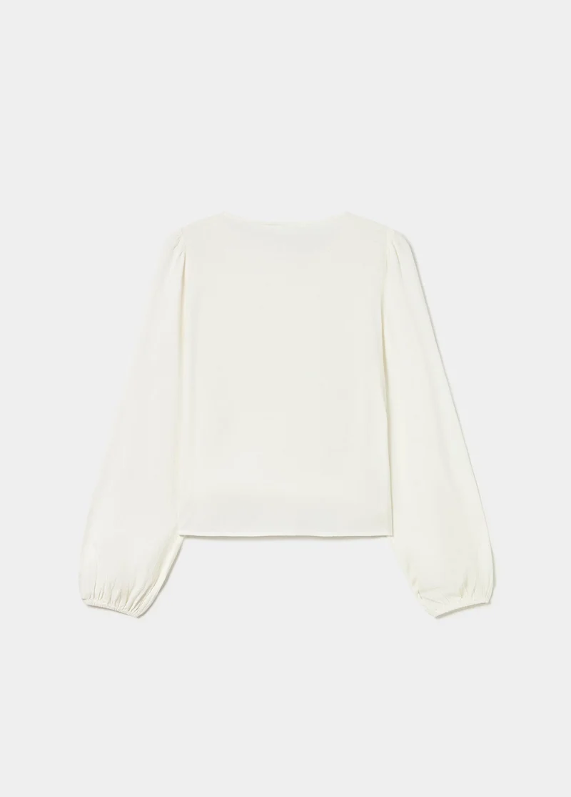 Long-sleeve smocked blouse