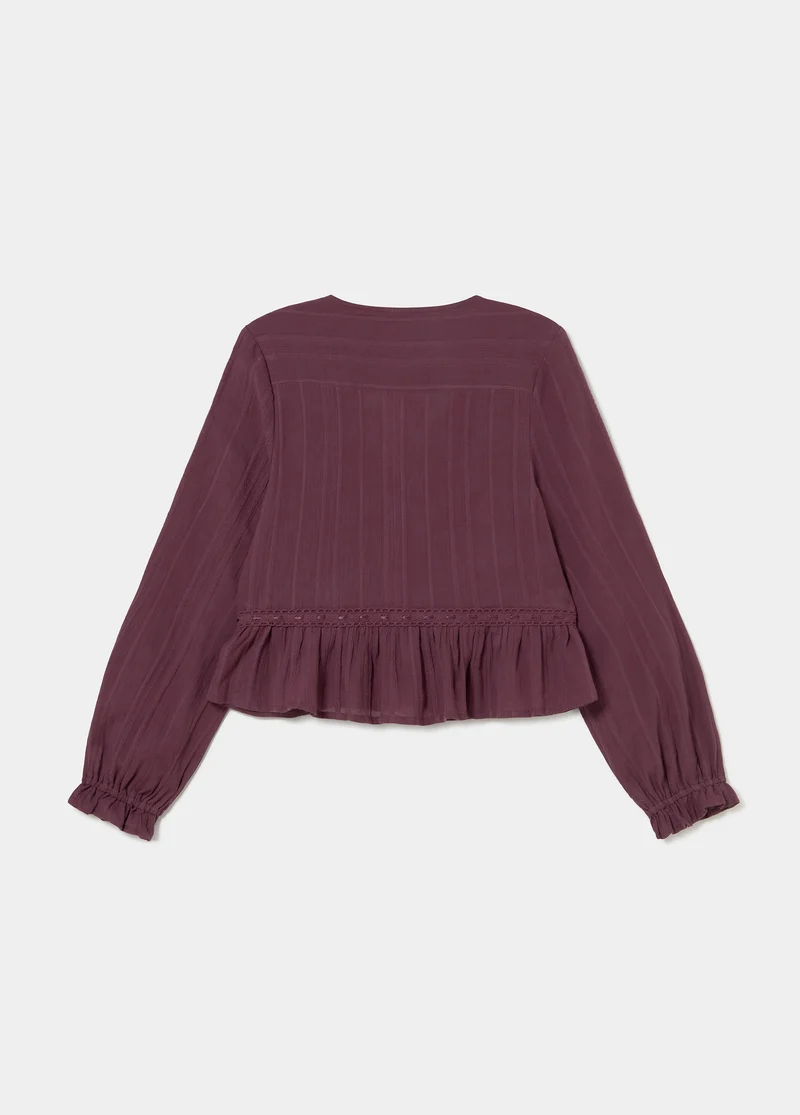 Long-sleeved ruffle blouse
