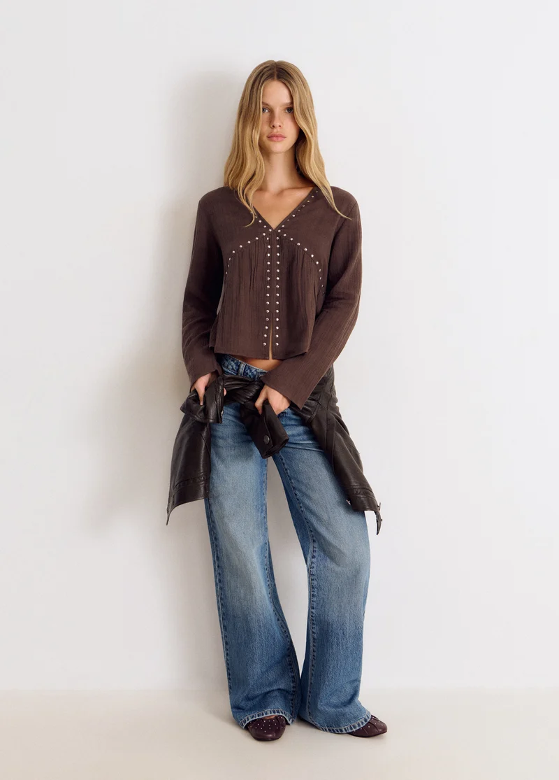 Long-sleeve studded V-neck blouse