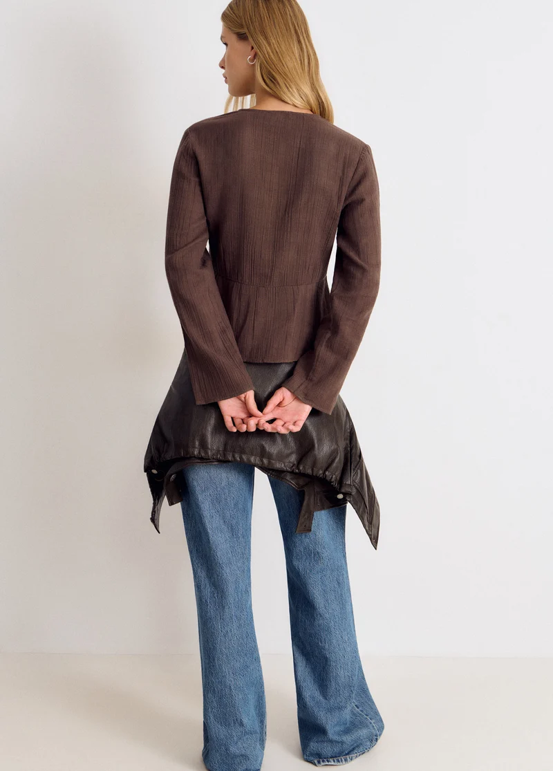 Long-sleeve studded V-neck blouse