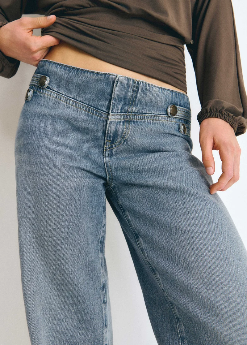 Denim with military-style button details