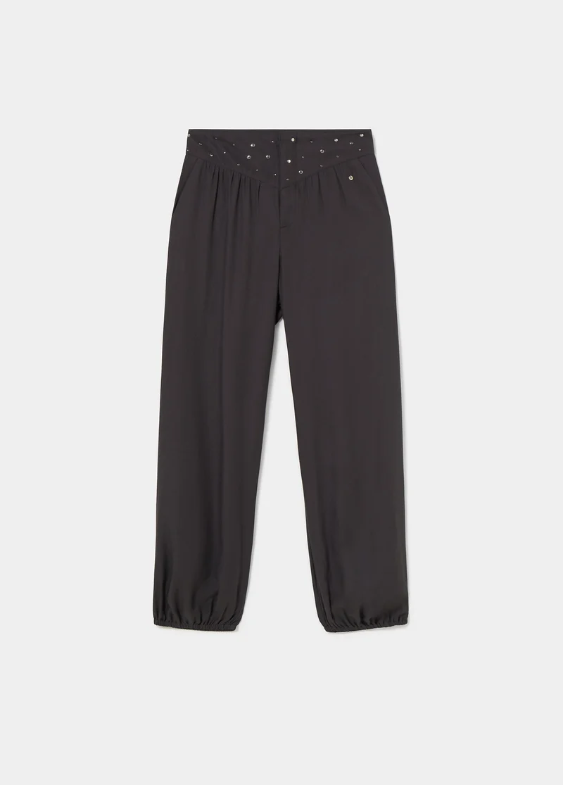 Harem pants with studded waistband