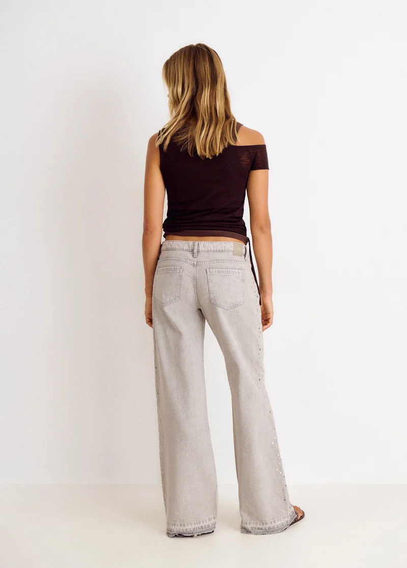 Jeans with side studs