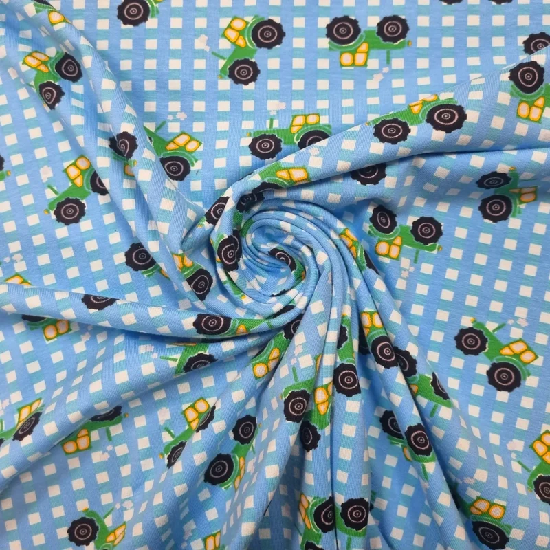 Baumwolljersey mit Traktoren blau 70 cm Reststück