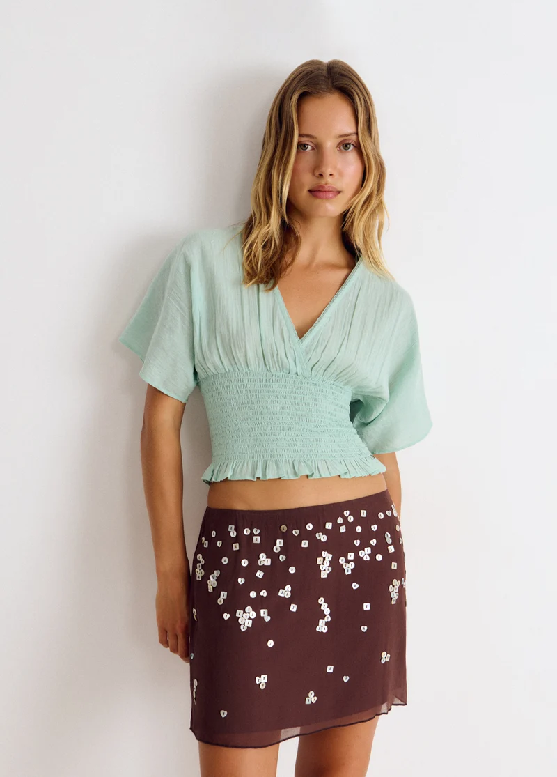 Short sequin skirt