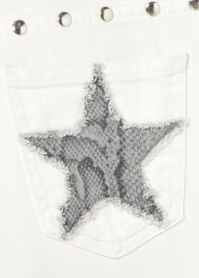 Low-rise pants with glitter stars and studs