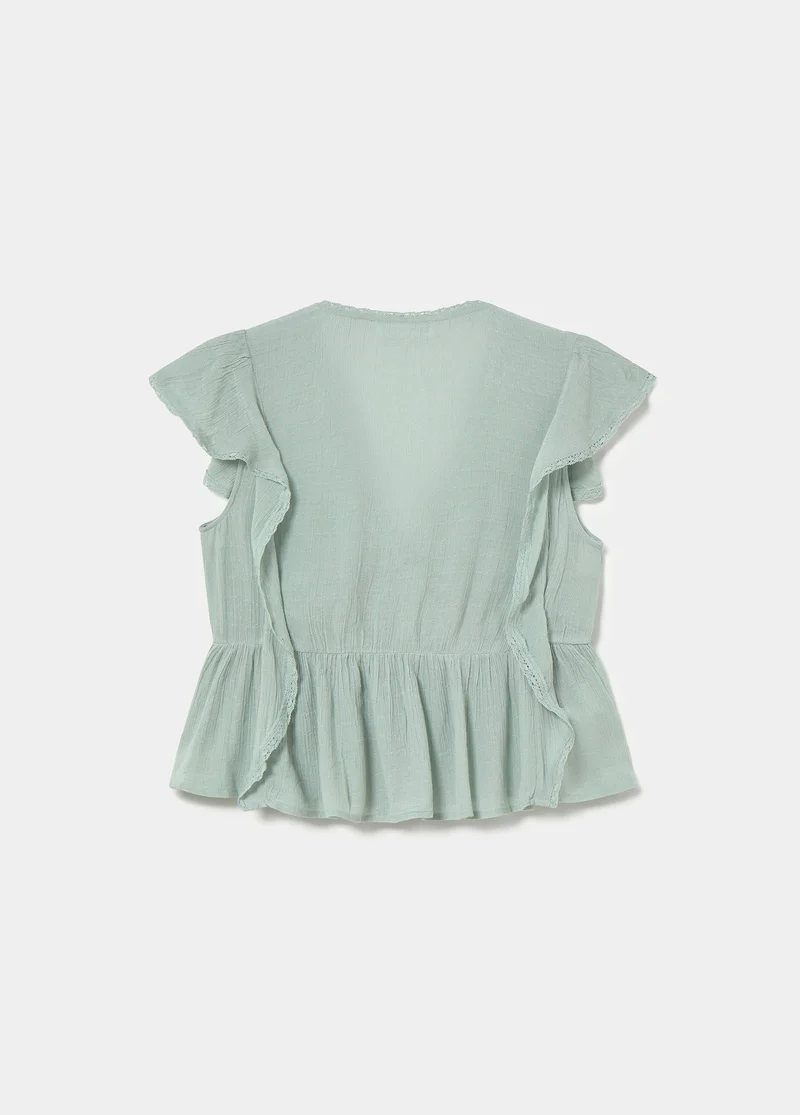 Romantic blouse with ruffles and lace trim
