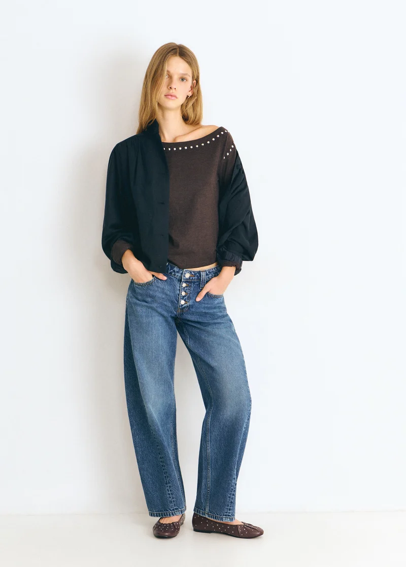 Asymmetric studded sweater