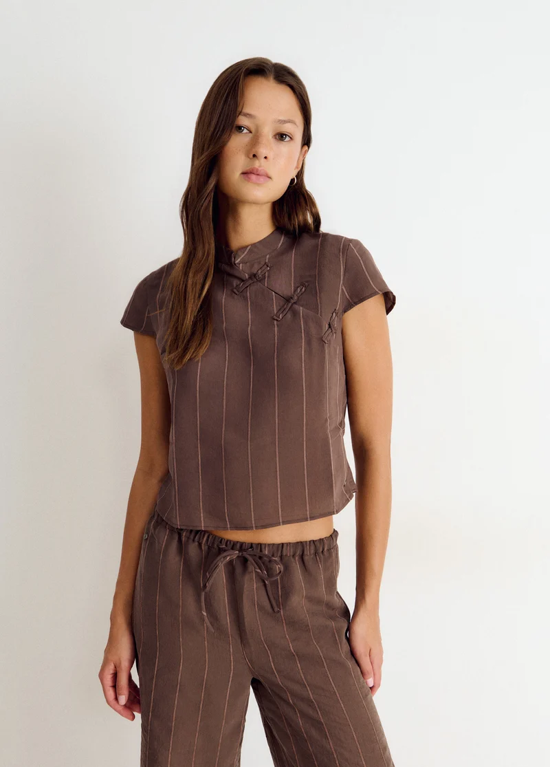 Striped tie-front top