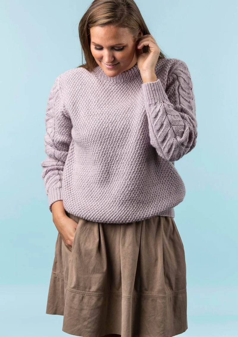Bluse in Struktur mit Muster an den Ärmeln