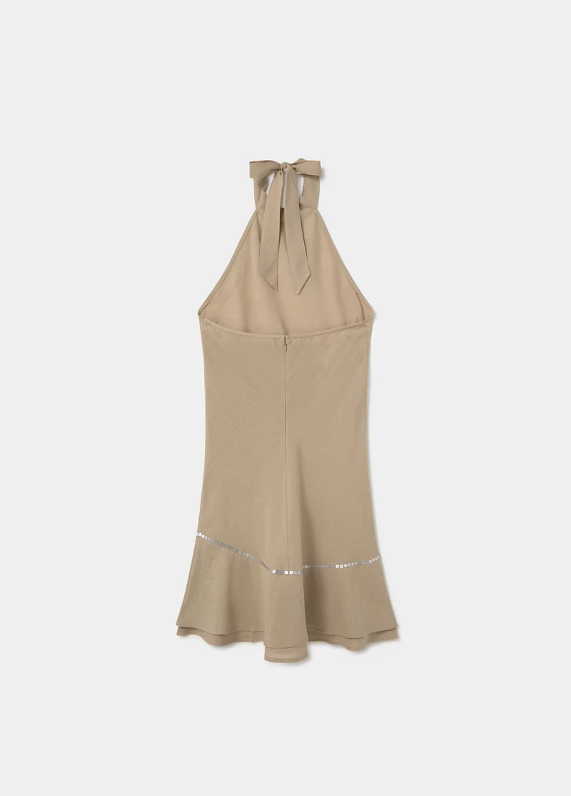 Short dress with asymmetrical hem and draped neckline
