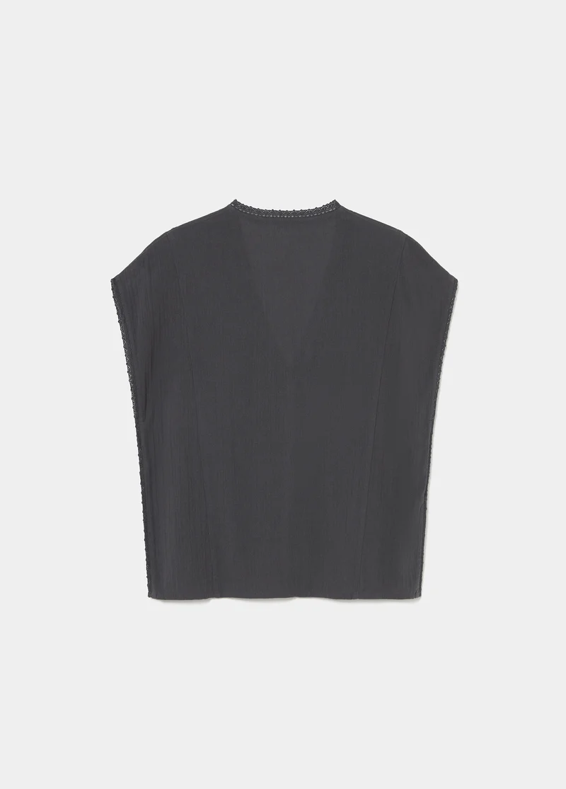Sleeveless sequin blouse