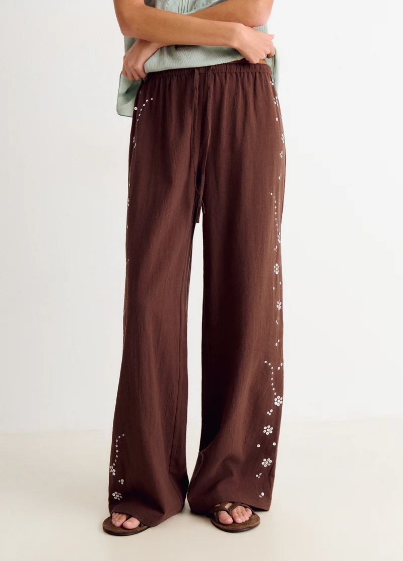 Flowy pants with side sequin detail