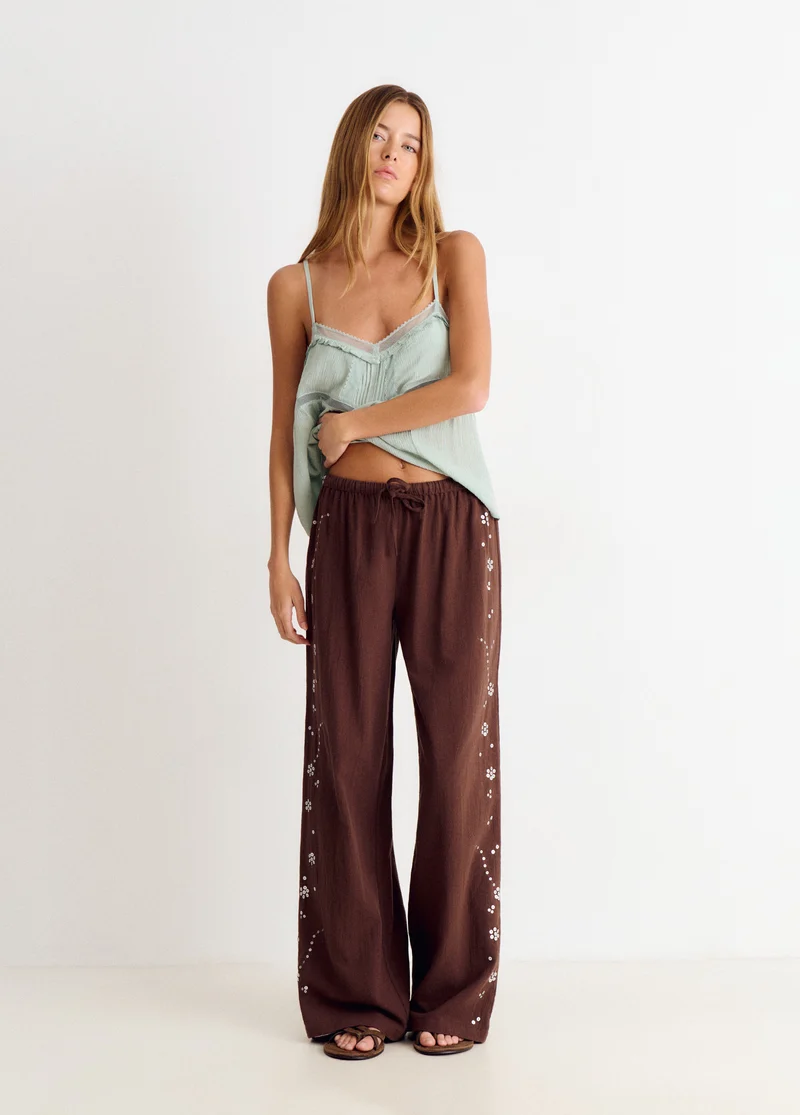Flowy pants with side sequin detail