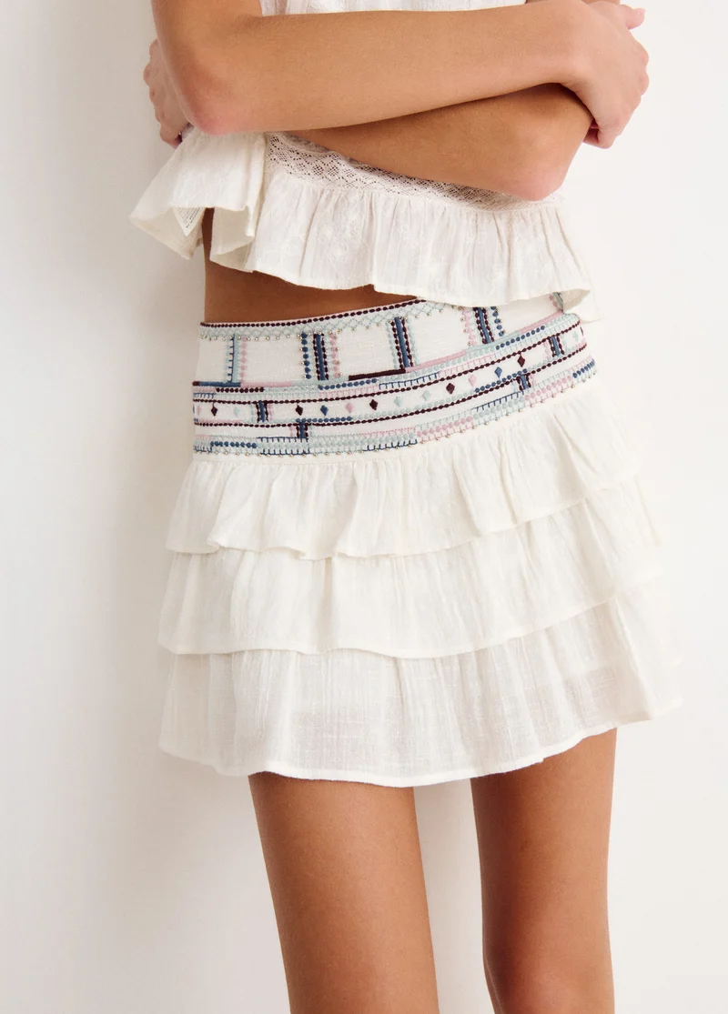 Printed skirt with beaded waist detail