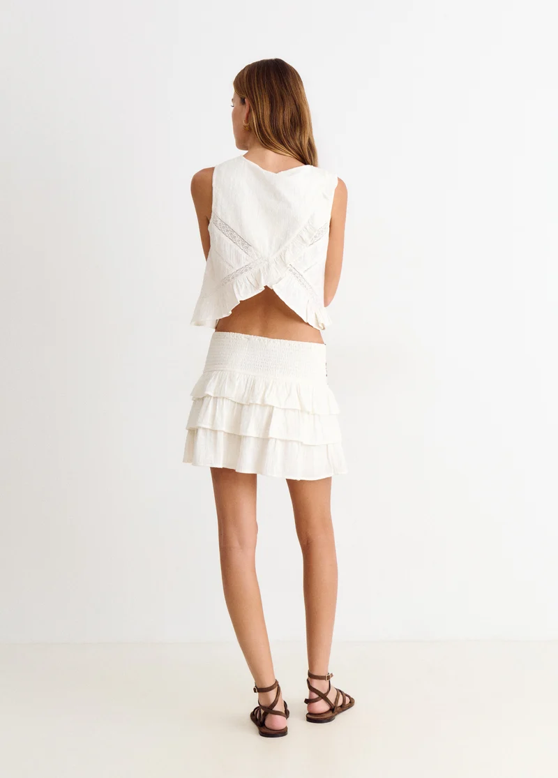 Printed skirt with beaded waist detail