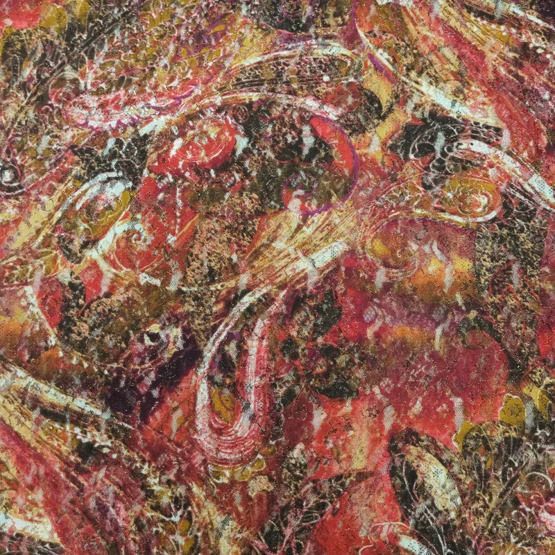 Spitze mit Paisleymuster und Goldschimmer