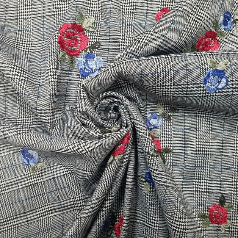 Viskosestoff grau mit Glencheck- und Blumenmotiv blau