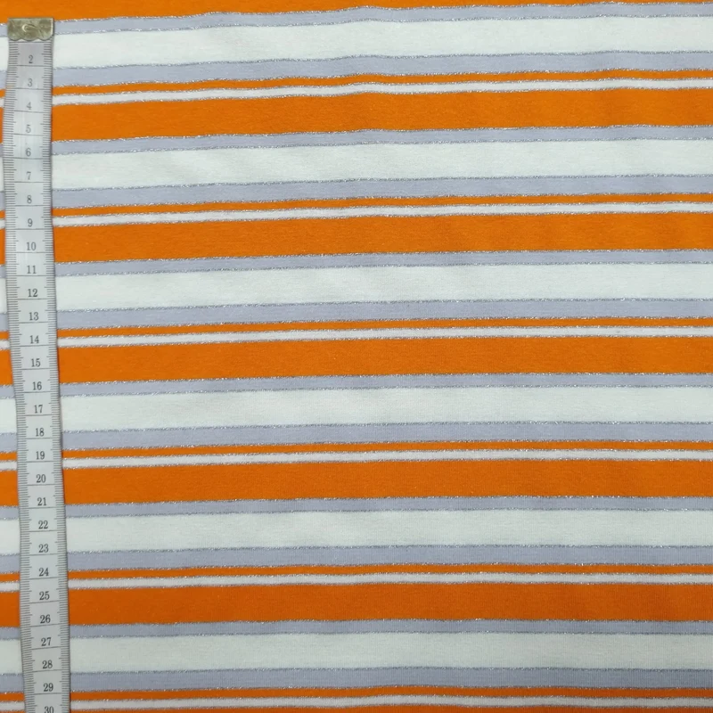 Viskosejersey gestreift weiß orange Lurex