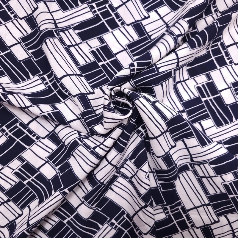 Viskosestoff mit geometrische Muster dunkelblau weiß
