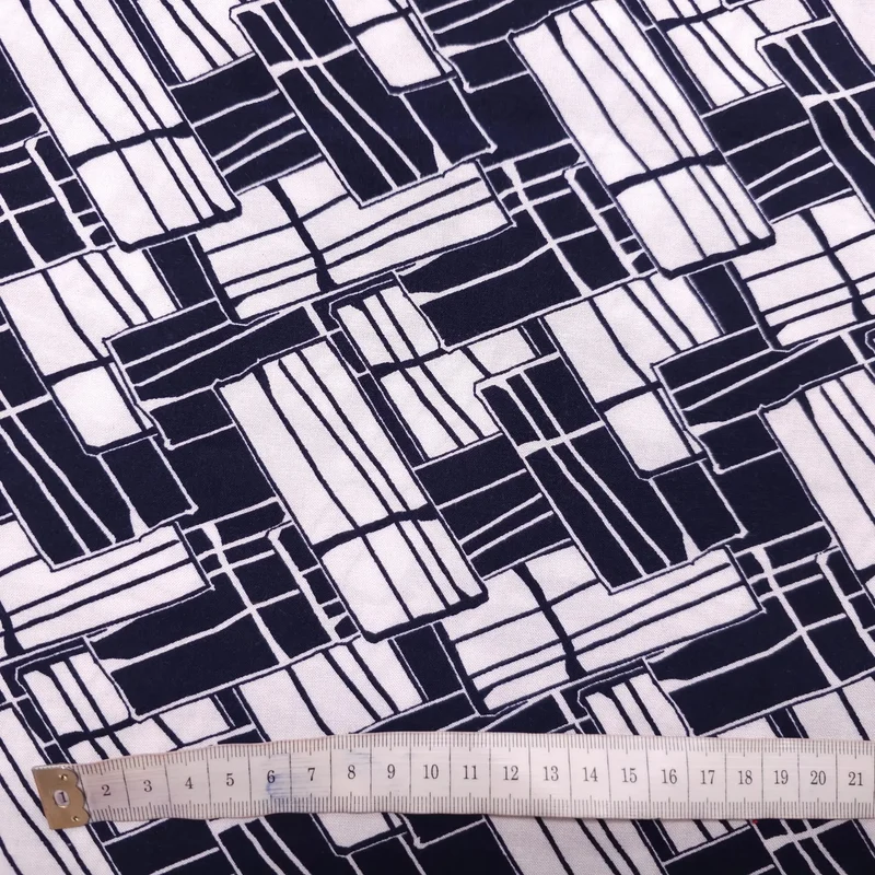 Viskosestoff mit geometrische Muster dunkelblau weiß