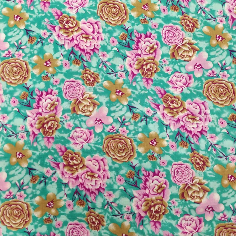 Viskosestoff mit Blumenmuster türkis
