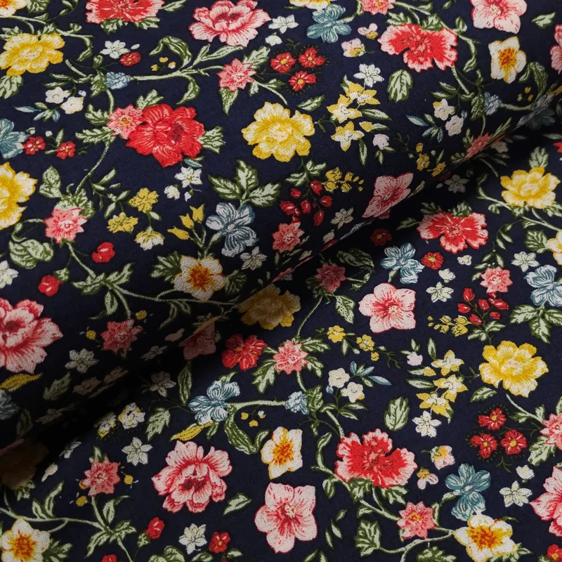Viskosestoff mit Blumen Motiv dunkelblau