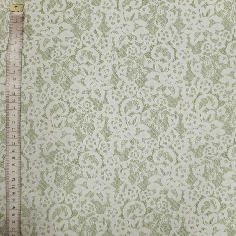Jacquard grün mit weißen Blumen