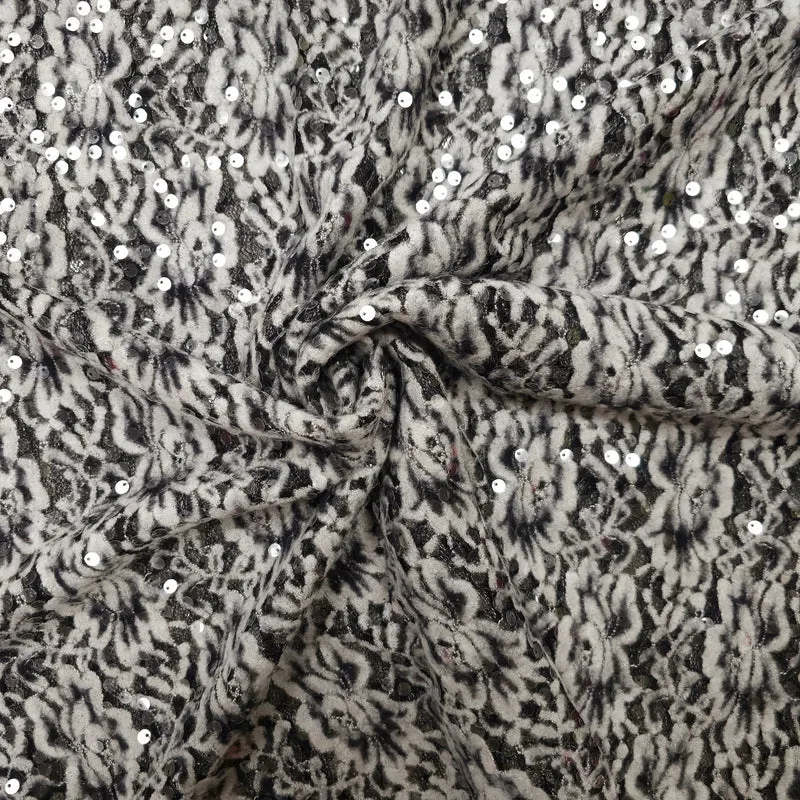 Spitze mit transparenten Pailletten schwarz weiß