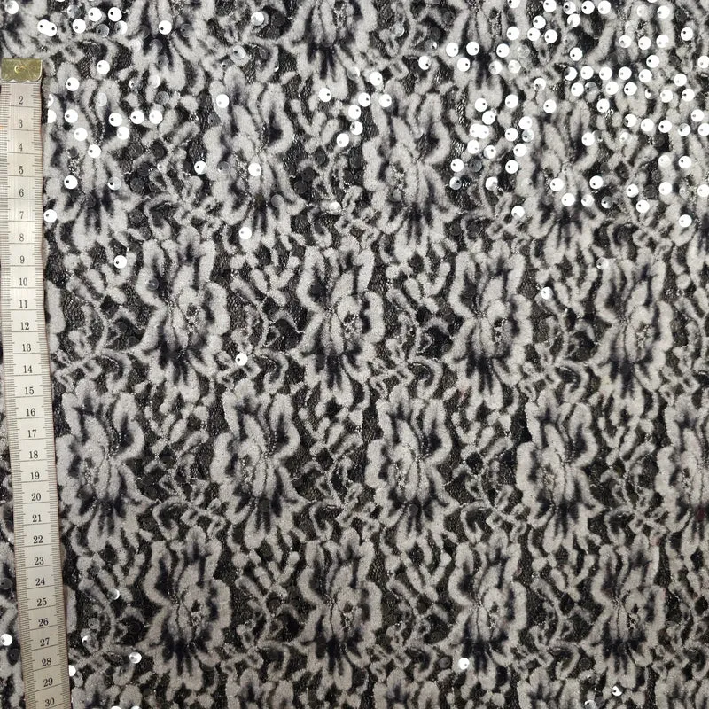 Spitze mit transparenten Pailletten schwarz weiß