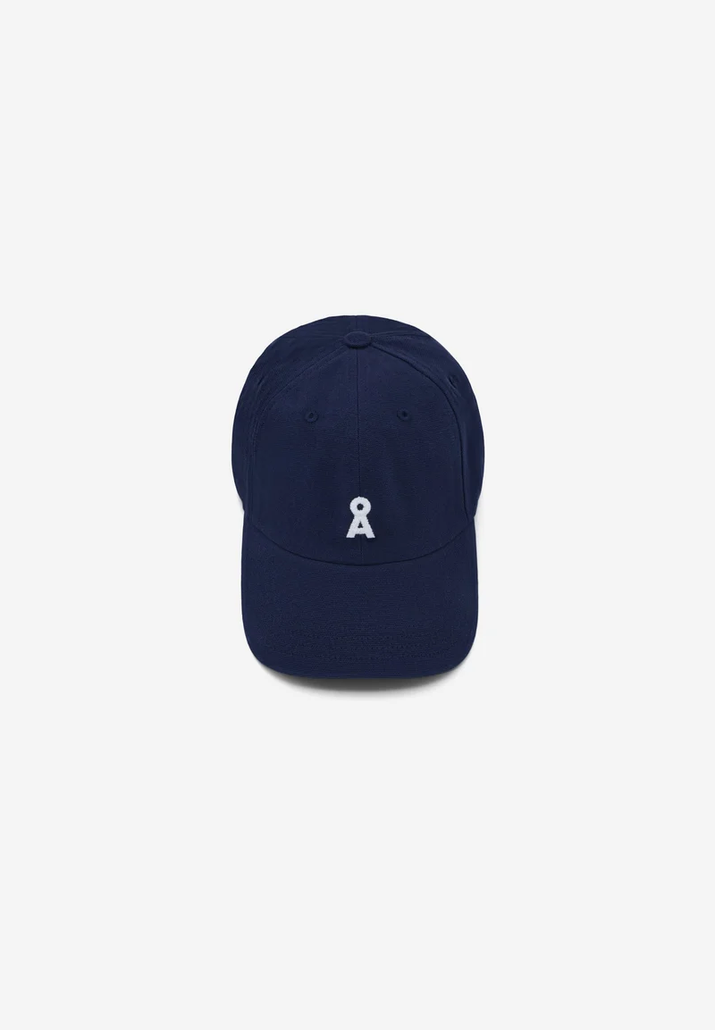 YENAAS BOLD KAPPE | tinted navy