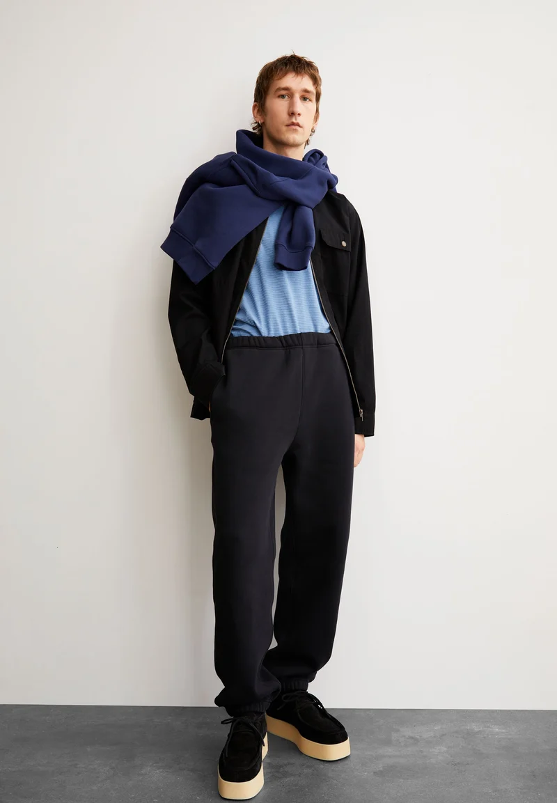 BAASTI FLEECE SWEATHOSE | black