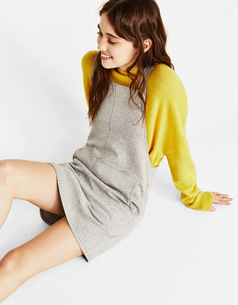 Short dungarees with pockets