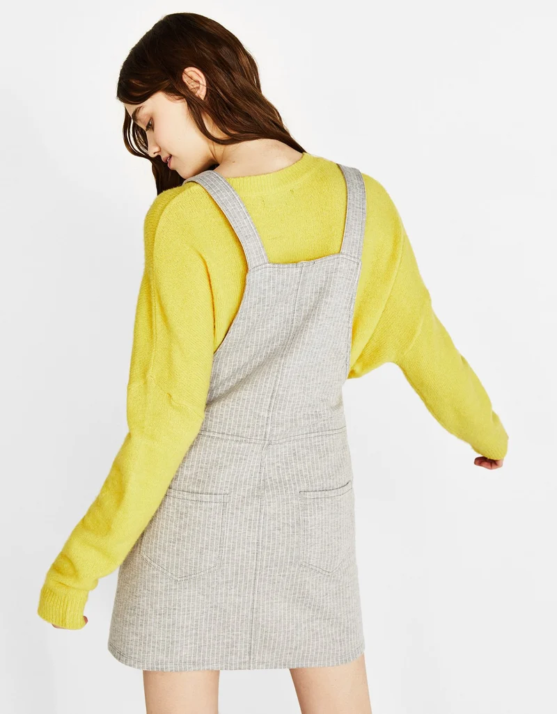 Short dungarees with pockets