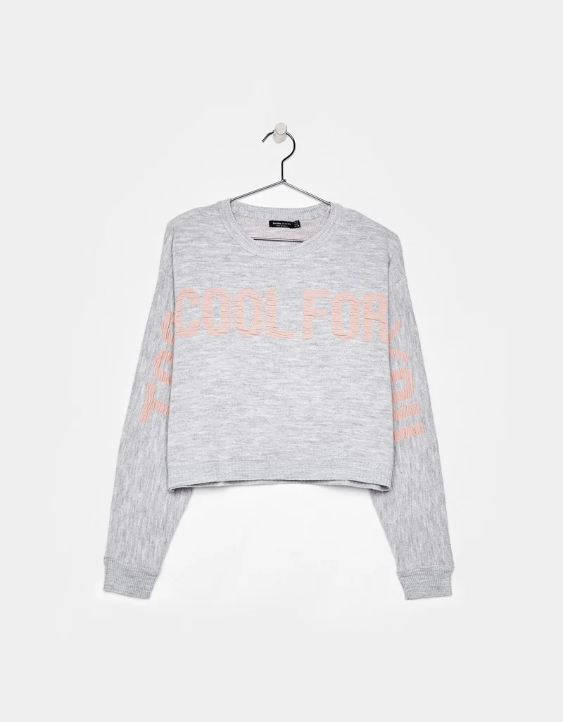 Sweater with slogan